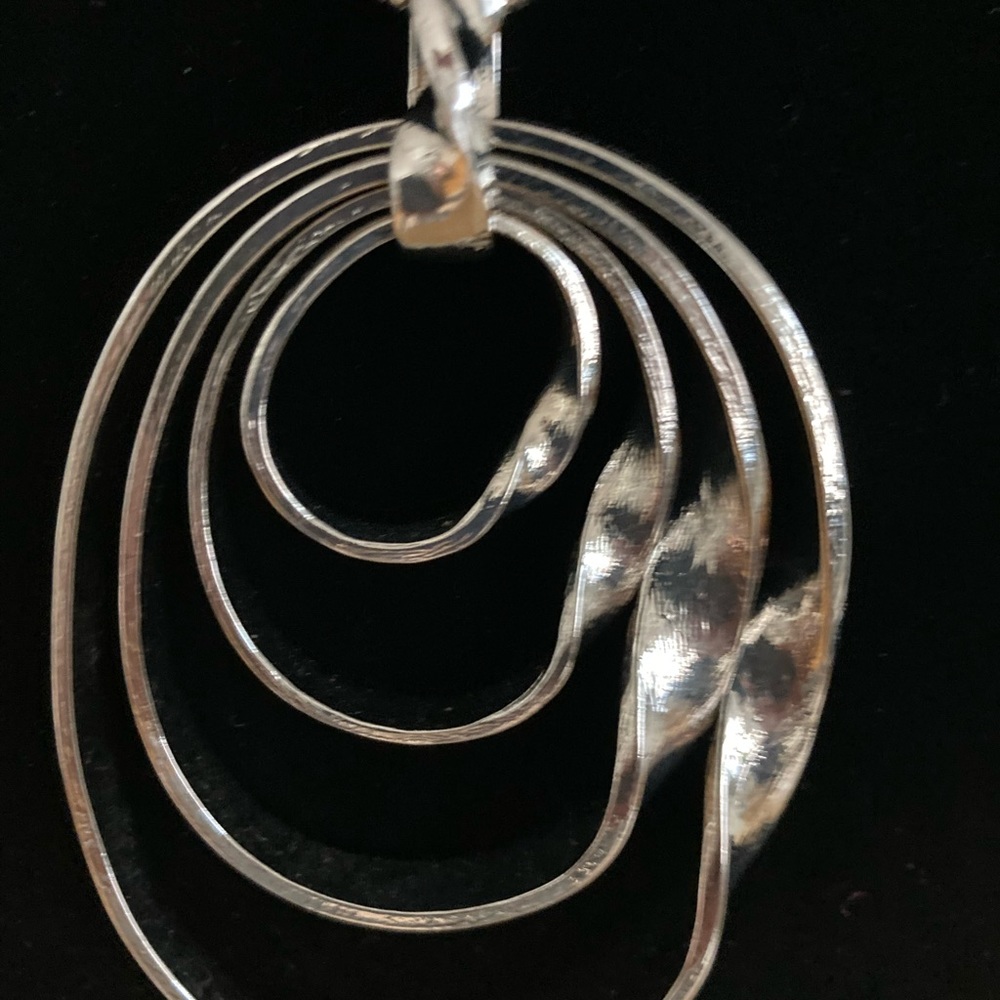 Chico’s silver metal statement necklace with extender. New with tag.